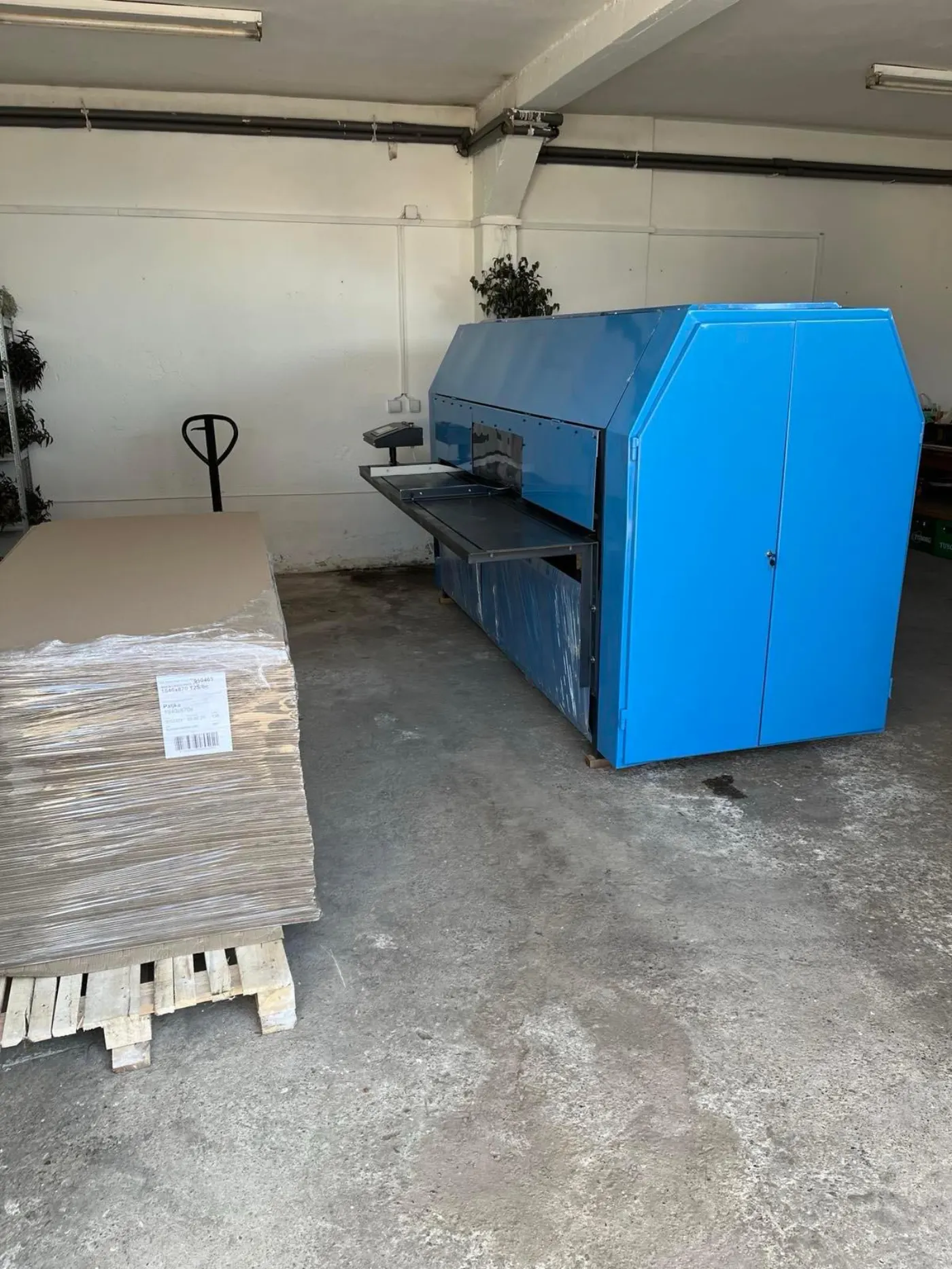 Cardboard box making machine in the Simform workshop